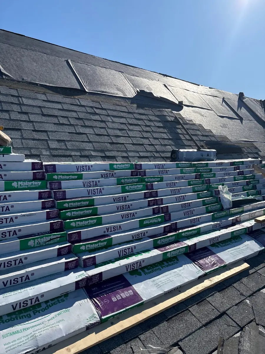 Malarkey Vista architectural shingle bundles staged across a roof
